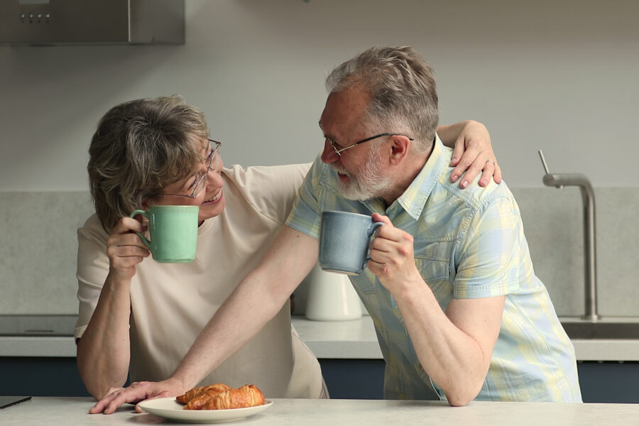 Smiling retired couple reflecting on lessons learned after seven years of retirement.